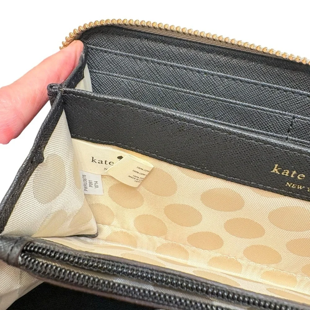 Kate spade cream and black saffiano leather bow wallet color block